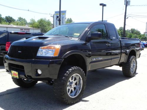 2012 nissan titan king cab pro-4x off-road 4x4 with 4-inch lift and 35&#034; tires