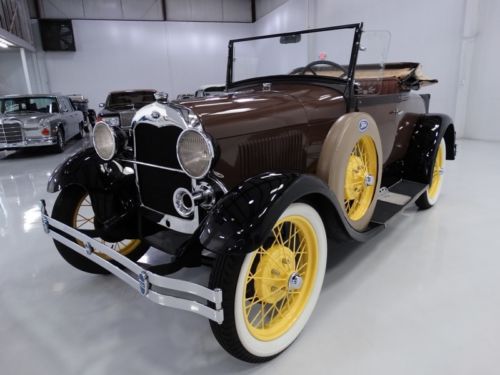 1929 model a ford roadster, black &amp; brown with yellow wheels and brown interior!