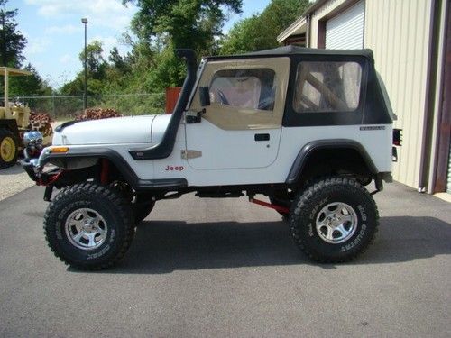 1990 white jeep wrangler lift kit snorkel 4 cylinder 4x4 dick cepek tires wheels