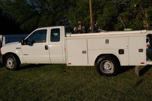 F350 diesel extended cab w/ utility bed and crane mount