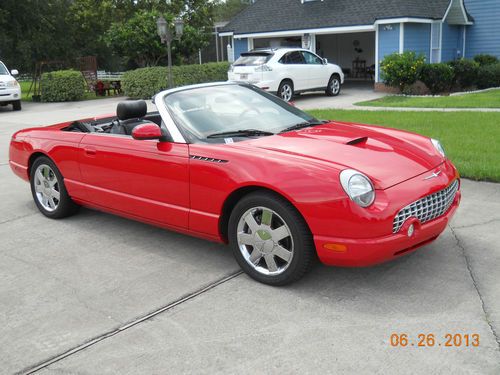Classic red 2002 thunderbird convertible with low miles