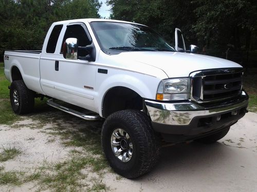 2004 f-250 4x4 fx4 6l diesel with super lift kit