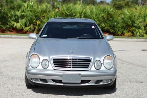 1999 mercedes benz clk320 coupe in silver with black interior and chrome wheels