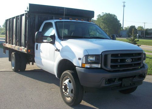 2004 ford f-450 super duty 4x2 flatbed with steel stake sides lic. #10394