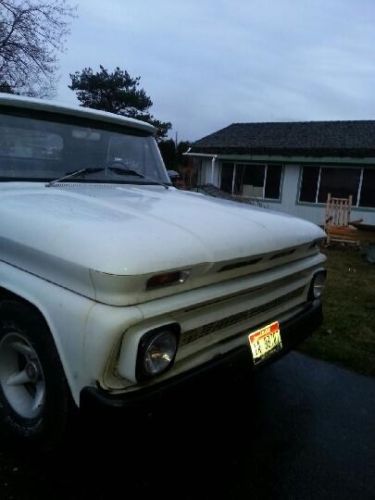 White, long bed, with original 327 4 speed manual, runs very good.