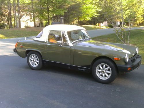 76 mg midget with hardtop, 5 speed conversion, weber, and uk minilite wheels.