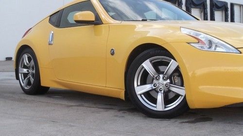 2009 nissan 370z touring yellow leather navigation wautomatic 3.7l v6 bluetooth