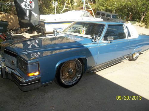 Low rider cadillac fleetwood brougham