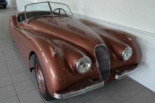 1954 jaguar xk 120 roadster in excellent restored condition.