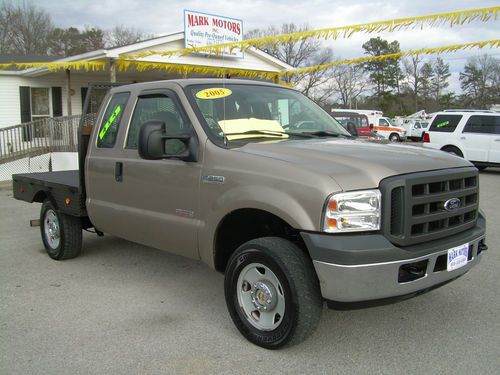2005 ford f-250 king cab 4x4 6.0 diesel only 87k miles flat bed ready to work!!!