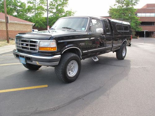 Ford f-250 xlt supercab longbed - custom topper holds 2,000 lbs.on roof!!!