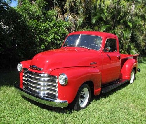 Beautifully restored 1953 chevy half ton red pick up truck
