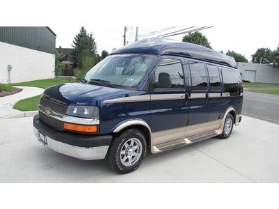 Great conversion  van! high top! regency awd! leather! 26" tv/dvd!no reserve! 04