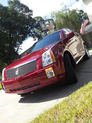 Cadillac srx red moon roof sport utility