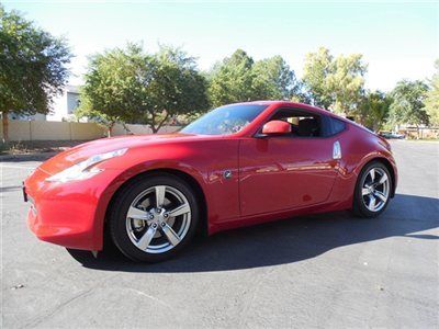 One owner nismo 370z with only 4400 miles,this car is perfect,still smells new