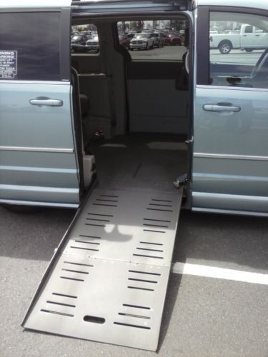 One owner with braun entervan mobility conversion. tri - zone air conditioning.