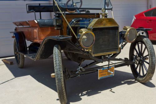 1914 ford model t pickup truck, brass, wood wheels, folding windsheild, lamps