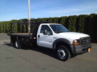 Diesel 6.0liter, automatic, 12' flatbed w/tow pkg. a/c, am&amp;fm radio