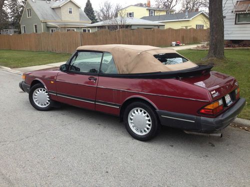 1993 red convertible, brand new tan top with rear defrost, only 115k miles