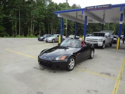 Honda s2000 roadster convertible black on red leather. has mp3 very low miles.