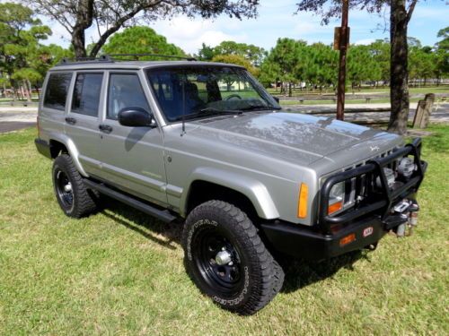 Florida 01 cherokee sport 60th anniversary lifted 4x4 clean carfax no reserve !!
