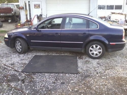 Blue 1.8 turbo 4 door very fast and very good on gas auto and air sun roof