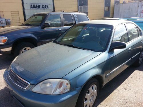 2000 honda civic 4 door ,  149k miles,  ice cold a/c,  no reserve!