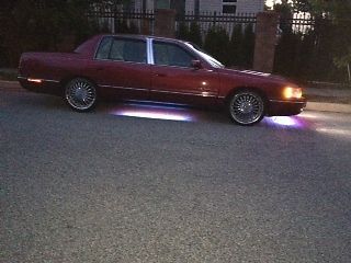 1998 one a kind burgundy cadillac deville concours