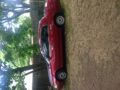 2000 lincoln town car (red) low mileage 4000