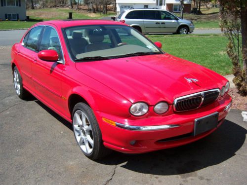 2003 jaguar x type red / cream leather fantastic condition ,garaged  maintained