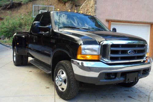 Beautful black 1999 ford f350 4x4 7.3 diesel dually with 91k original miles!