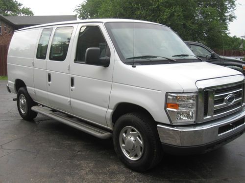 2010 ford e-250 only 28k miles, power all, flex fuel, nice tires, safety wall