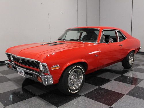 Bright red, 350 ci, horseshoe shifter w/console, power steering, spinners