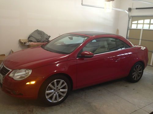 2009 volkswagen eos komfort, well maintained, perfect color salsa red on tan.