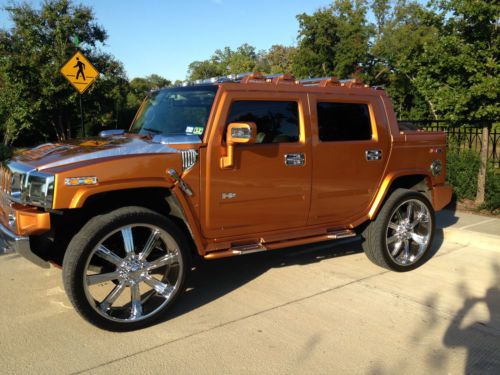 Fully loaded, leather, sunroof, excellent condition, custom 28 inch wheels