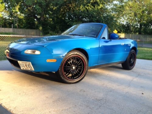 1992 mazda miata mx5 with a automatic transmission, custom wheels and hardtop