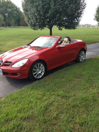 Red, hard top convertable, 2 door coupe, automatic transmission, loaded.