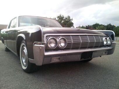 1964 lincoln continental with suicide doors. black on black. runs great !