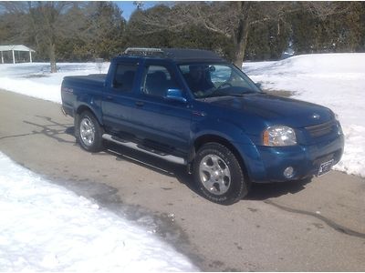 2001 nissan frontier supercharged v6 low miles, leather, 4x4, full 4 door rare!!