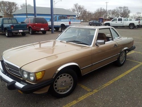 1987 mercedes 560 sl, gold with both tops.