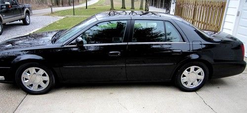 2001 cadillac  dts 1 owner estate sale black on black, mint condition,
