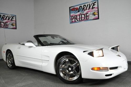 White soft top leather chrome bose sound pwr seats