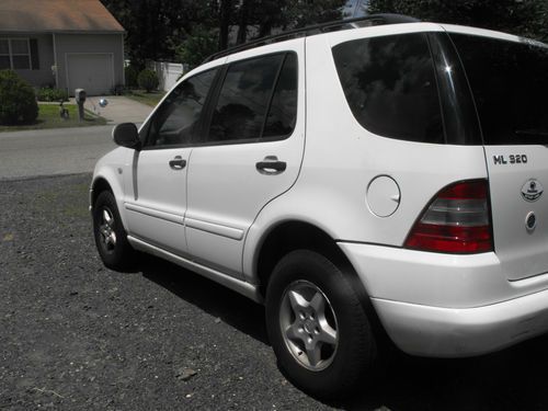 ~~2000 mercedes benz ml320~~7 passenger~~all wheel drive~~repair or for parts~~