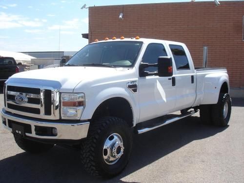 2008 ford f350 crew cab 4x4 lifted dually powerstroke diesel 90k miles no res.
