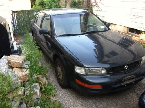 95 nissan maxima  "parts only car"