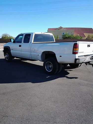 2001 chevey duelly 50k original miles 8100 gas motor this truck is like new