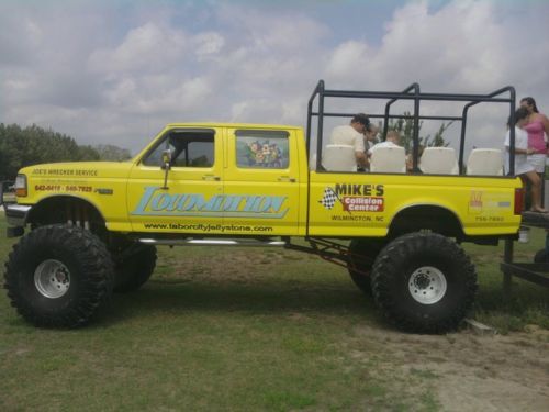 Ford f-350 crew cab lifted 4x4 monster truck yellow