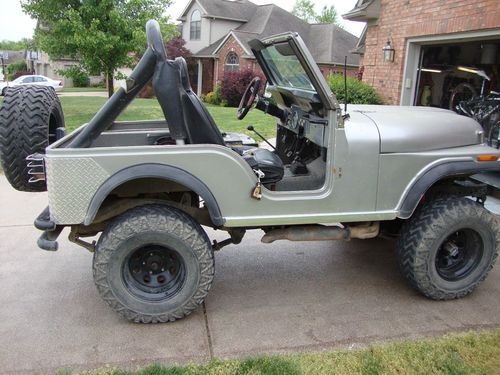 For sale a 1978 cj5. fiberglass body. 32 in mickey thomson tires