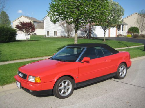 97 audi cabriolet, red/black automatic front wheel dr. 2.8 liter convertible 98k