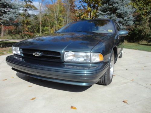 1996 impala ss  rare color  super clean  well maintained  low miles  great car!